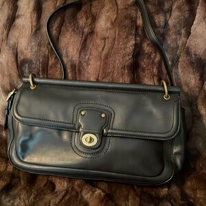 Leather coach bag in black